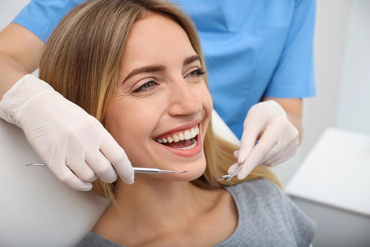 Doctor-Examining-Patients-Teeth