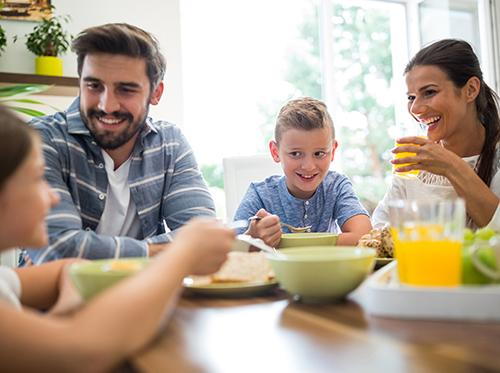 Family photo eating breakfast