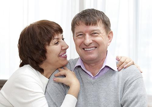 Husband and wife smile image