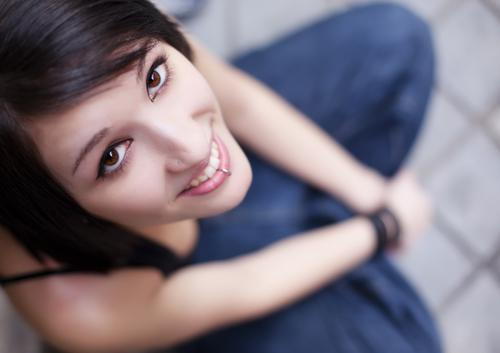 Smiling lady looking up image